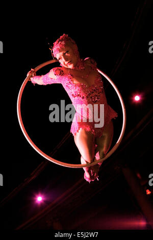 Cabaret performer Empress Stah performing live in a hula hoop Stock Photo