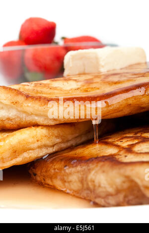 Strawberries & Pancakes with Maple Syrup and Butter Stock Photo