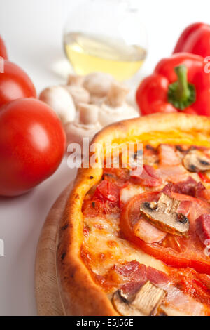 Ham and Mushroom Pizza with Ingredients Stock Photo