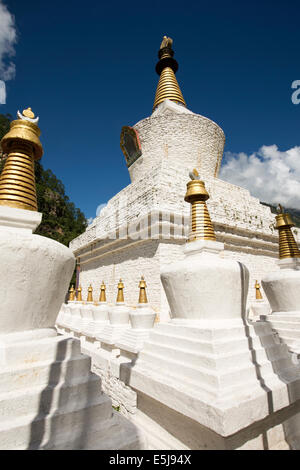 Eastern Bhutan, Lhuentse Valley Autsho, white Tibetan style brick built chorten Stock Photo