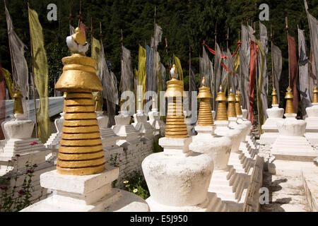 Eastern Bhutan, Lhuentse Valley Autsho, white Tibetan style chorten, surrounding 108 stupas Stock Photo