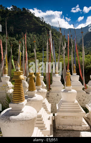 Eastern Bhutan, Lhuentse Valley Autsho, white Tibetan style chorten, surrounding 108 stupas Stock Photo