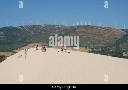 Visitors of Valdevaqueros Sand Dunes, Punta Paloma, Beach at Tarifa taking photos, Costa de la Luz, Spain. Stock Photo