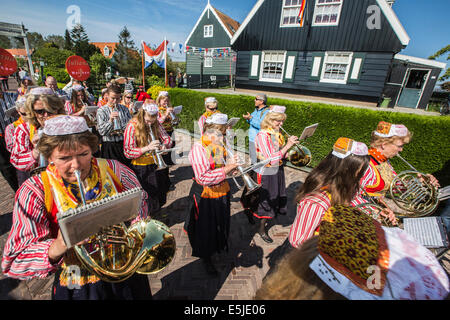 Netherlands, Marken, People dressed in traditional costume on Kingsday, 27 April