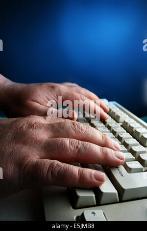 Hands close-up typing on the keyboard Stock Photo
