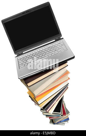 Laptop over books stack isolated over white background Stock Photo