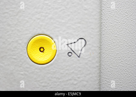 Alarm button and icon of bell close-up Stock Photo