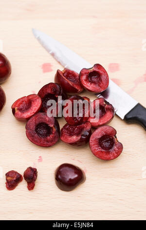 Preparing fresh Cherries. Stock Photo