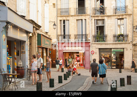 Street scene, with tourists, in Pezenas, France Stock Photo