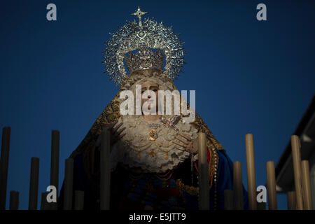 An image of the Holy Name of Mary is displayed on procession of Palm Sunday during Easter Week in Prado del Rey, Spain Stock Photo