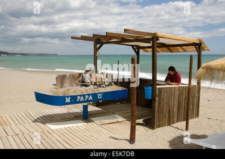 Fresh fish BBQ on a Beach outside a restaurant in La Cala De Mijas, Costa Del Sol, Malaga, Spain Stock Photo