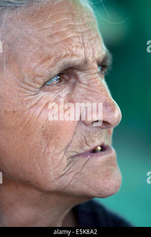 Elderly woman in profile at the market in Stepanakert,, unrecognized state of Nagorno-Karabakh Stock Photo