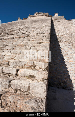 Zig Zag Shadow leading to the Temple. Stairs leading to the top of the Adivino pyramid cast a zig zag pattern on the  pyramid Stock Photo