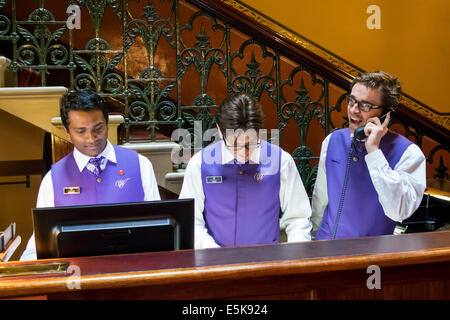 Melbourne Australia,Spring Street,The Windsor,hotel,hotel,hotels,lobby,concierge,bellhop,bellman,uniform,Asian man men male,job,working work worker wo Stock Photo