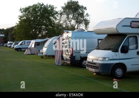 Caravans and camper vans at Warwick Folk Festival site Stock Photo