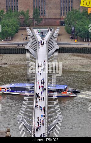 Millennium Bridge crossing the River Thames , London, England, UK. Stock Photo