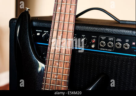 Five string bass guitar with combo amplifier Stock Photo