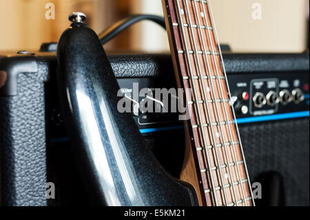 Five string bass guitar with combo amplifier Stock Photo