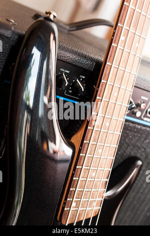 Five string bass guitar with combo amplifier Stock Photo