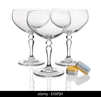 Dishwasher tablets with glass wine glasses on white background isolate Stock Photo