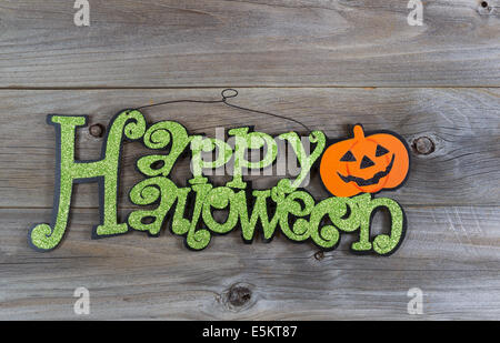 Top view of Halloween sign with objects on rustic wood Stock Photo