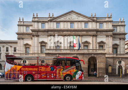 Sightseeing bus in front of La Scala, Milan, Lombardy, Italy Stock Photo