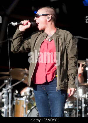 Lulworth Castle, Dorset, UK. 03rd Aug, 2014. Sinéad O'Connor performing on stage at Camp Bestival, at Lulworth Castle in Dorset, England. 3RD August 2014 Credit:  brian jordan/Alamy Live News Stock Photo