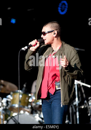 Lulworth Castle, Dorset, UK. 03rd Aug, 2014. Sinéad O'Connor performing on stage at Camp Bestival, at Lulworth Castle in Dorset, England. 3RD August 2014 Credit:  brian jordan/Alamy Live News Stock Photo