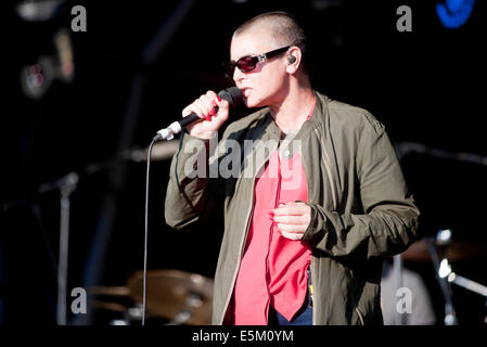 Lulworth Castle, Dorset, UK. 03rd Aug, 2014. Sinéad O'Connor performing on stage at Camp Bestival, at Lulworth Castle in Dorset, England. 3RD August 2014 Credit:  brian jordan/Alamy Live News Stock Photo