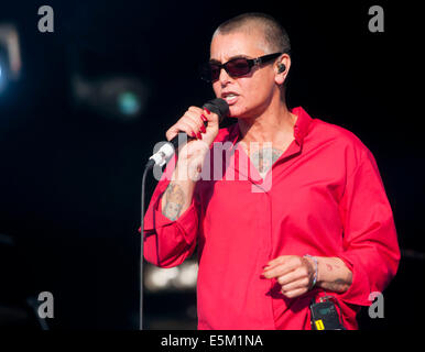 Lulworth Castle, Dorset, UK. 03rd Aug, 2014. Sinéad O'Connor performing on stage at Camp Bestival, at Lulworth Castle in Dorset, England. 3RD August 2014 Credit:  brian jordan/Alamy Live News Stock Photo