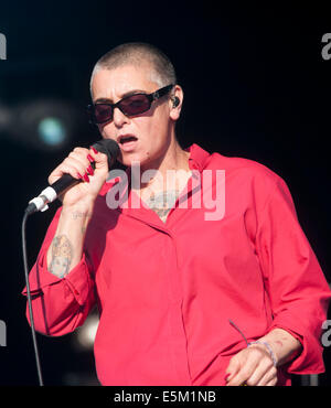 Lulworth Castle, Dorset, UK. 03rd Aug, 2014. Sinéad O'Connor performing on stage at Camp Bestival, at Lulworth Castle in Dorset, England. 3RD August 2014 Credit:  brian jordan/Alamy Live News Stock Photo