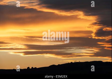 A really spectacular summer evening sunset over the town of Presteigne in mid Wales, UK Stock Photo