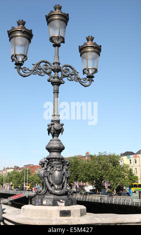 Victorian triple lamp on O'connell bridge Dublin Stock Photo