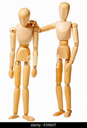 a manikin encouraging another Stock Photo
