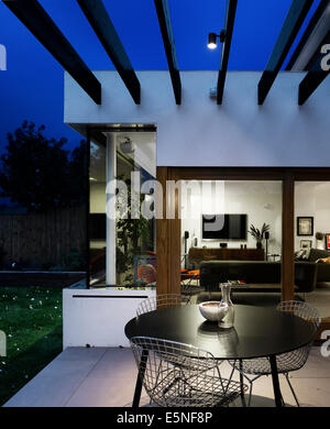 Lit terrace of High Barnet family home, London by Paul Archer Design Stock Photo