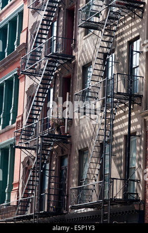 Fire Escape, Tribeca, Manhattan, New York City, New York. A fire escape is a special kind of emergency exit, usually mounted to Stock Photo