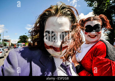 Belfast, Northern Ireland. 3rd Aug, 2014. 'The Joker' and 'Harley Quinn' during the Feile an Phobail (People's Festival) opening parade Credit:  Stephen Barnes/Alamy Live News Stock Photo