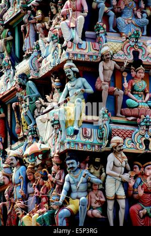 SINGAPORE:  Figures of gods, goddesses, and mythological beasts adorn the sikhara entrance tower at  Sri Mariamman Hindu temple Stock Photo
