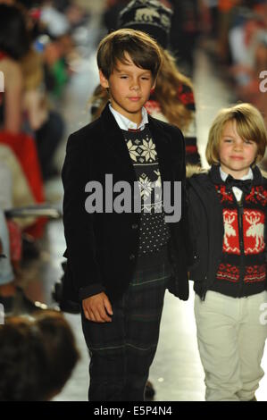 NEW YORK, NY - MAY 19: Models walk the runway at the Ralph Lauren Fall 14 Children's Fashion Show in Support of Literacy Stock Photo