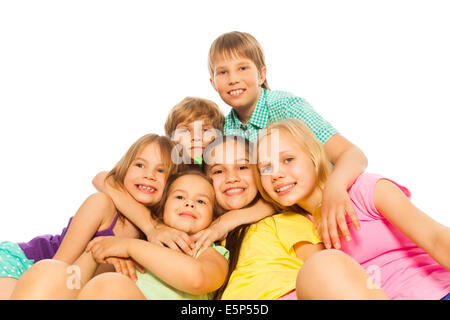 Six children hugging together Stock Photo