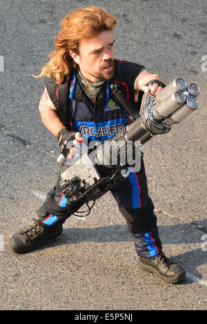 Toronto, Ontario, Canada. 4th Aug, 2014. On the movie set at 909 Bay Street in Toronto. 'Pixels' is an upcoming 2015 American 3D live-action/computer-animated film produced by Columbia Pictures and Happy Madison Productions. The film is directed by CHRIS COLUMBUS from a screenplay written by Tim Herlihy and Timothy Dowling. Main actors: ADAM SANDLER, KEVIN JAMES, JOSH GAD, PETER DINKLAGE, MICHELLE MONAGHAN, BRIAN COX, ASHLEY BENSON, and JANE KRAKOWSKI.Principal photography on the film began on June 2, 2014 in Toronto, Canada. Credit:  ZUMA Press, Inc./Alamy Live News Stock Photo