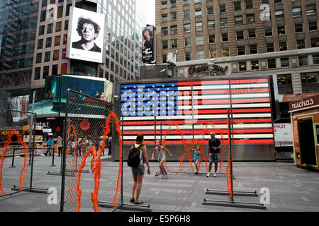 New York, US. 4th Aug, 2014. Digital billboards across New York's Times Square display 58 classic and contemporary works of American art, officially starting Art Everywhere US. From now through August 31st, as many as 50,000 digital static displays in all 50 states - billboards on city streets and rural highways, displays on bus shelters and subway platforms, diaramas in airports, video's in health clubs, trailers in movie theatres and more - will present the largest outdoor art show ever conceived Credit:  Scott Houston/Alamy Live News Stock Photo