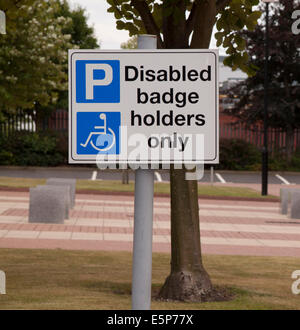 Disabled parking badge holders only sign in a UK car park. Stock Photo