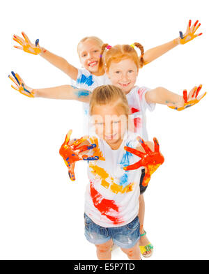 Three girls show painted palms Stock Photo