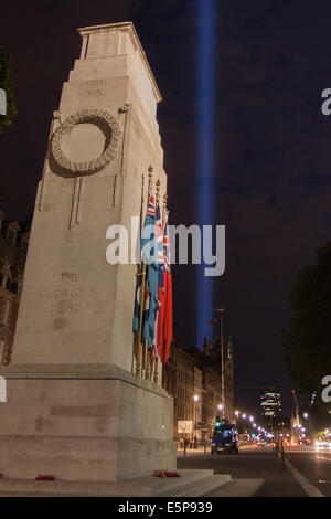 London, UK. 4th Aug, 2014.The Cenotaph remains illuminated as a  shaft of light rises from behind the Houses of Parliament, as Britain remembers the outbreak of World War 1 a century ago. Credit:  Paul Davey/Alamy Live News Stock Photo