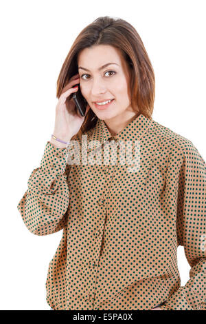 Beautiful woman making a call on her mobile phone wearing brown business shirt, Attractive young woman talking on cellphone Stock Photo