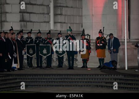 Belfast City Hall Grounds, Ireland. 4th Aug, 2014. A bugler sounds the last post at 11:00 pm to mark Commemoration of the Centenary of the outbreak of the First World War at Belfast Cenotaph Credit:  Bonzo/Alamy Live News Stock Photo