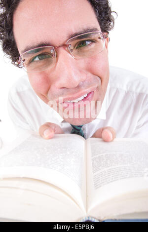 close up of nerd in shirt and tie with glasses holding open book, funny image Stock Photo