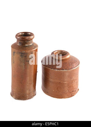 Vintage clay ink wells on a white background. Stock Photo