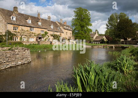 Cotswold stone cottages on the River Eye, Lower Slaughter, Cotswolds, Gloucestershire, England, United Kingdom, Europe Stock Photo